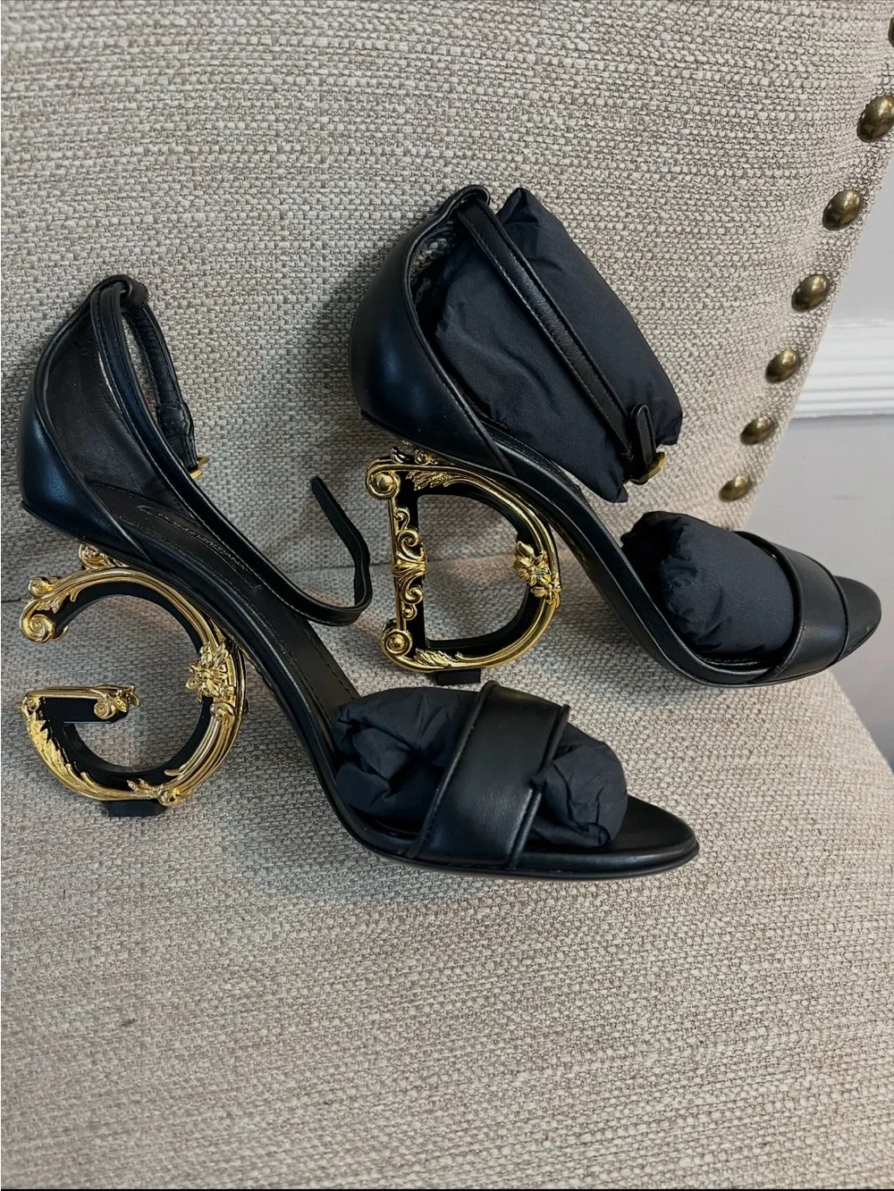 Dolce & Gabbana Black Leather Sandals with Ornate Gold Scroll Heels